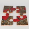 Four Scott Hockenhull Wall Hung Puzzle Tiles