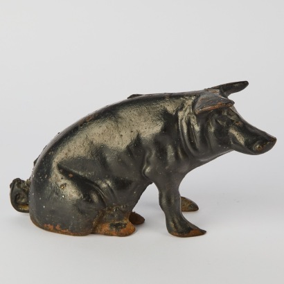 An Antique Cast Iron Piggy Bank