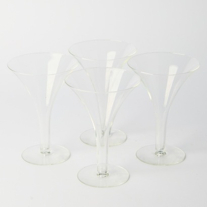 A set of four Vintage Hollow Stemmed Champagne Flutes