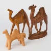 A collection of three Camel Figurines