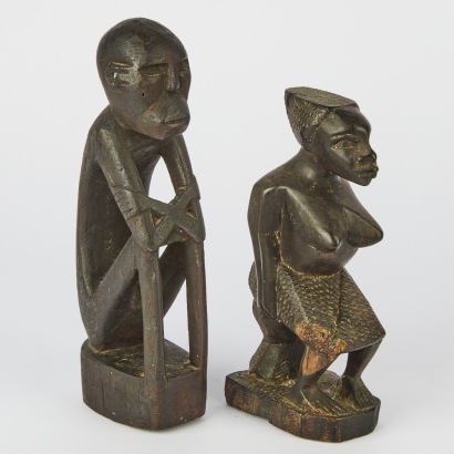 A pair of Carved African Figurines