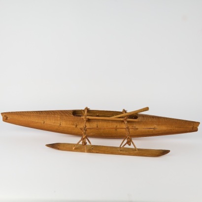 A Vintage Polynesian Model Outrigger Canoe with Paddle