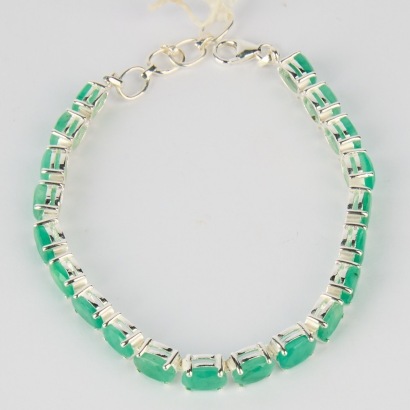 A Sterling Silver Bracelet with Emeralds