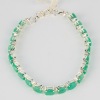 A Sterling Silver Bracelet with Emeralds