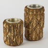 A Pair of Ponga Candle Holders