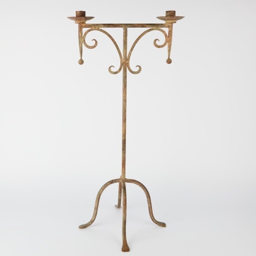 A Tall Wrought Iron Candelabra