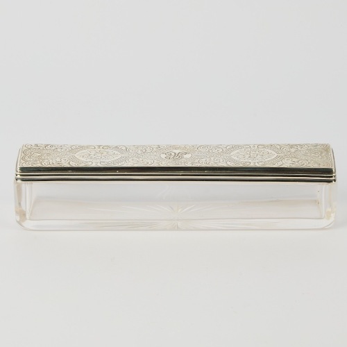 A Silver Lidded Glass Container