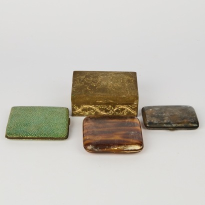 A Set of Four Old Cigarette Cases