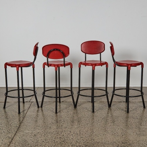 A Set of Four Red Sebel Cosmic Barstools