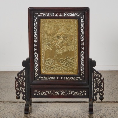 A Chinese Rosewood Table Screen with a Copper Dragon Panel