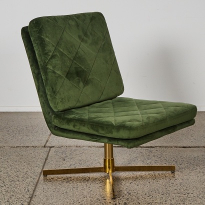 A Green Velvet Swivel Chair