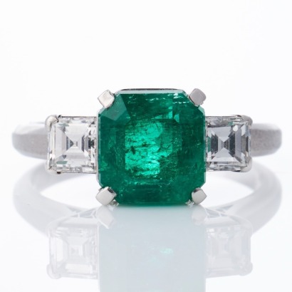 Platinum, 2.53ct Emerald / 0.67ct Diamond Three Stone Ring