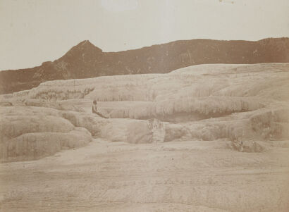 UNKNOWN PHOTOGRAPHER Figure sitting on the Pink and White Terraces