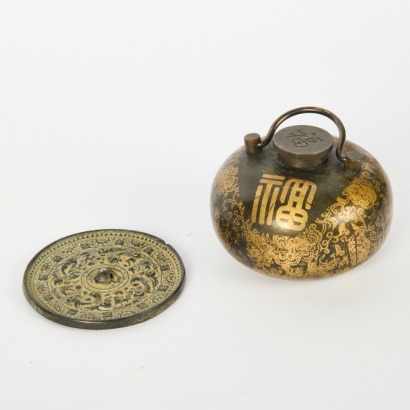 A Set of Two Chinese Bronze Pieces Comprising a Hand Warmer and a Mirror