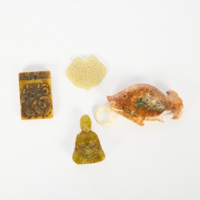 A Set of Four Chinese Small Carved Jade Pieces