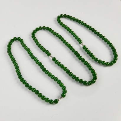 A Set of Three Green Bead Necklaces