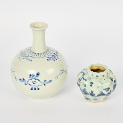 A Set of Two Chinese Blue and White Pieces Comprising a Vase and a Small Figural Jar