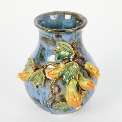 A Polychrome Carved Porcelain Vase with Fruit and Vegetable Motifs