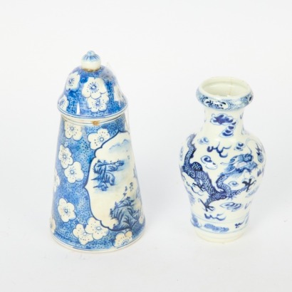A Set of Two Chinese Blue and White Pieces Comprising a Dragon Vase and a Landscape Jar and Cover