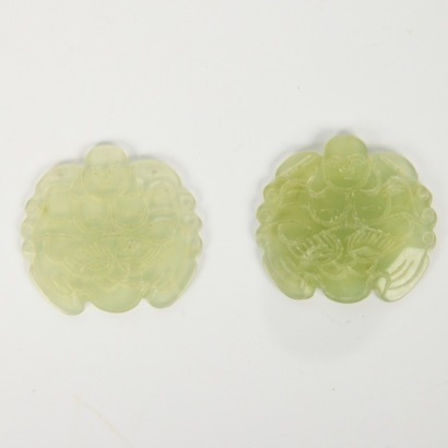 A Set of Two Chinese Carved Jade Buddha Pendants