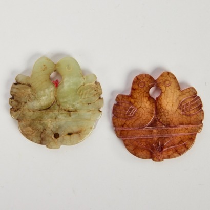 A Set of Two Chinese Carved Jade Bird Pendants