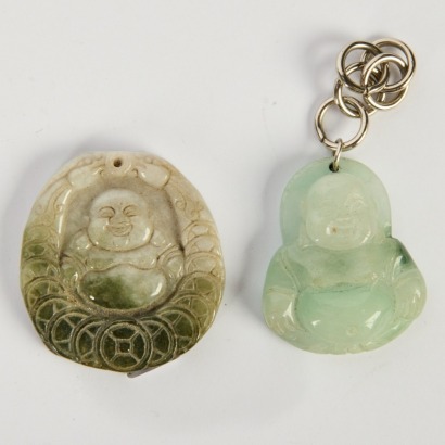 A Set of Two Carved Jade Buddha Pendants