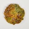 A Chinese Carved Jade Mythical Beast Pendant
