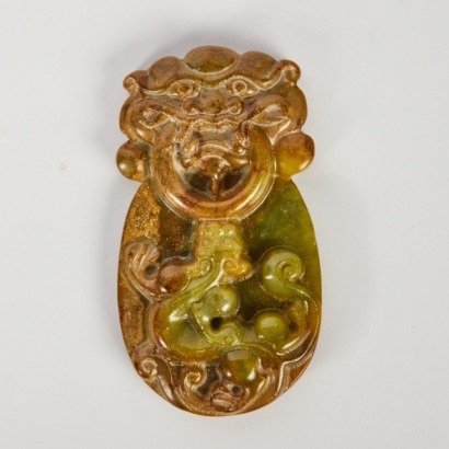A Chinese Carved Jade Plaque with a Chi Dragon