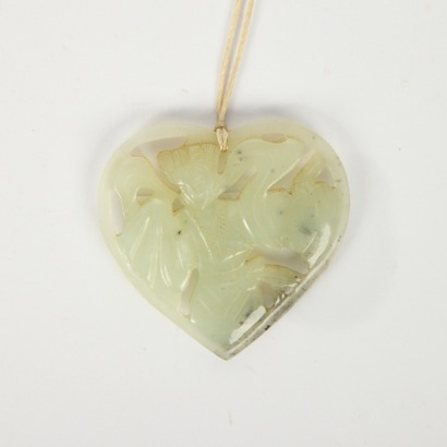 A Chinese Carved Green Jade Figural Pendant