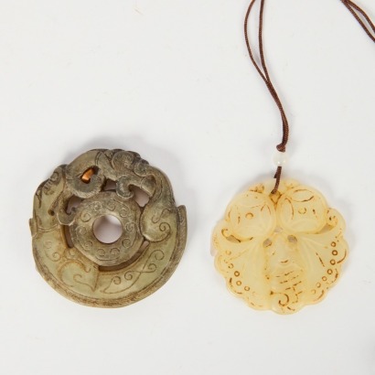 A Set of Two Chinese Carved Jade Chi Dragon Pendants