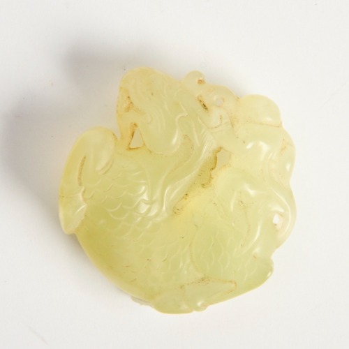 A Chinese Carved Jade Mythical Beast Pendant