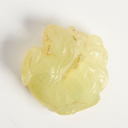 A Chinese Carved Jade Mythical Beast Pendant
