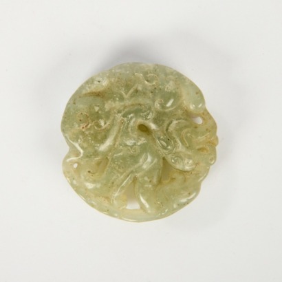 A Chinese Carved Jade Mythical Beast Pendant