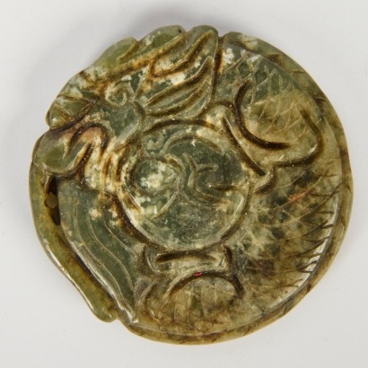 A Chinese Carved Jade Mythical Beast Pendant