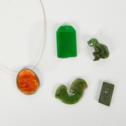 A Set of Five Small Chinese Green Jade Carvings