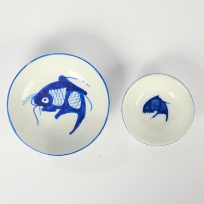A Group of Twenty-Eight Chinese 20th Century Blue and White 'Fish' Dishes