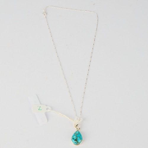 A Sterling Silver Chain with Turquoise Pendant