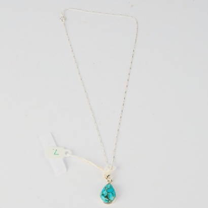 A Sterling Silver Chain with Turquoise Pendant
