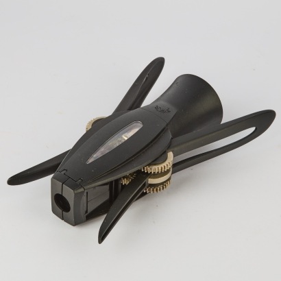A VacuVin wine bottle opener made in Holland