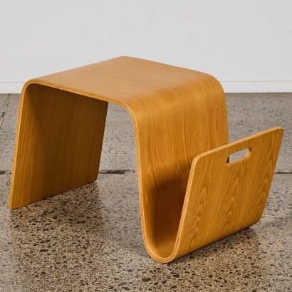 A Sleek Moulded Oak Offi Magazine Table
