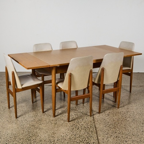 A Seven-Piece Mid-Century Dining Suite by Elite Furniture