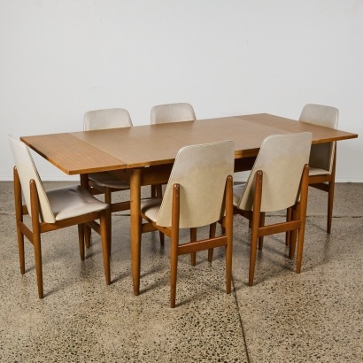 A Seven-Piece Mid-Century Dining Suite by Elite Furniture