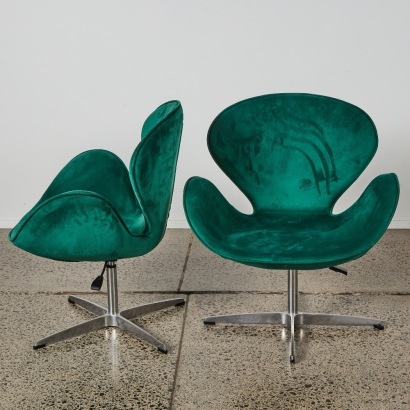 A Pair of Green Velvet Swivel Chairs