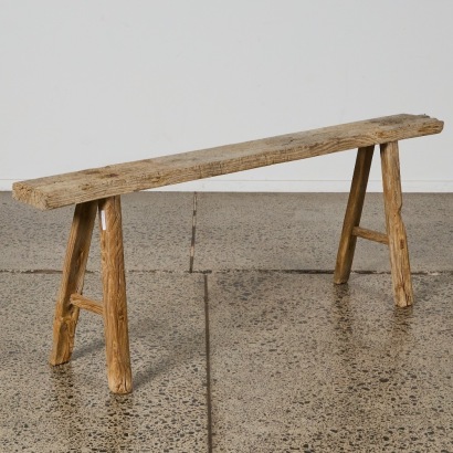 A Rustic Wooden Trestle Bench