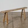 A Rustic Wooden Trestle Bench