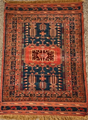 A Vintage Hand-Knotted Baluchi Tribal Rug