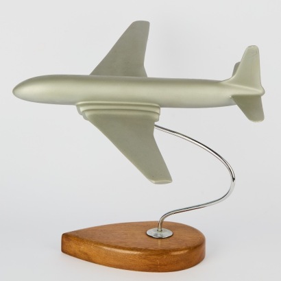 A Vintage Plane Model on Wooden Stand