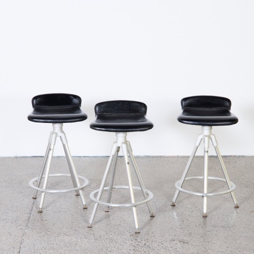 A Set of Three Aluminium and Black Leather Stools by Joan Casas Ortinez for Indecasa, Spain