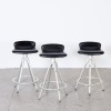 A Set of Three Aluminium and Black Leather Stools by Joan Casas Ortinez for Indecasa, Spain