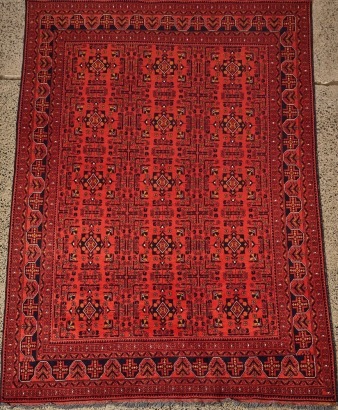 A Large Vintage All-Wool Hand-Knotted Afghan Rug